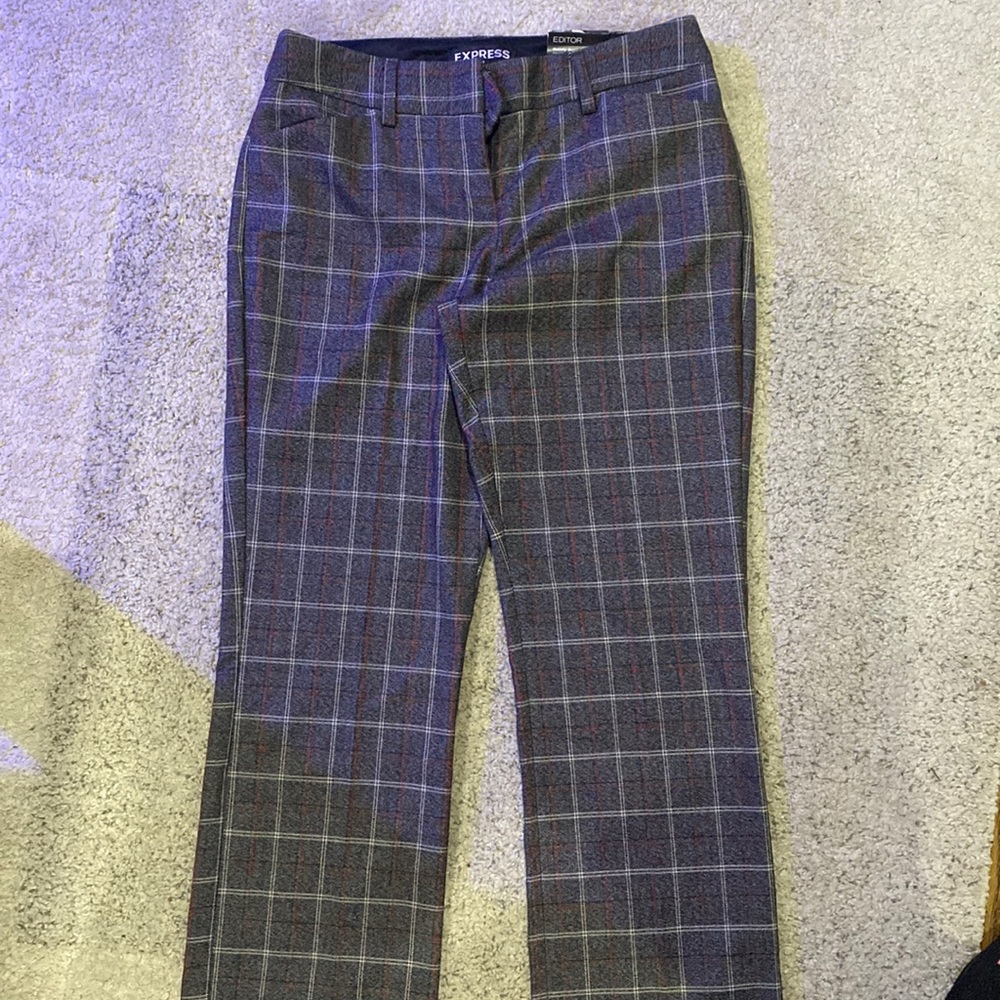 Women’s dress slacks. Brand is Express. Never worn. Checkered pattern!